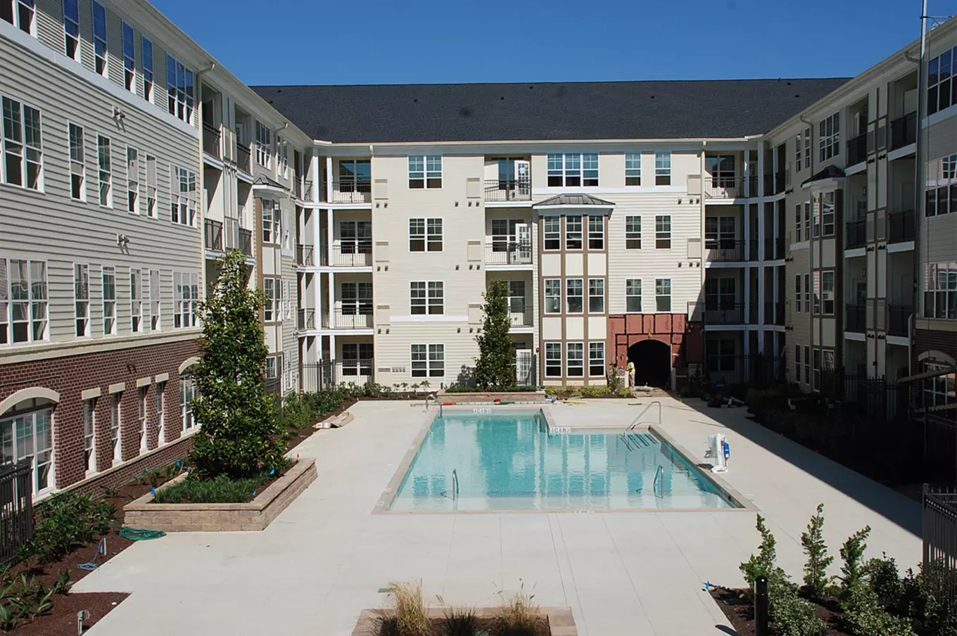 Multifamily housing photo of condos with pool