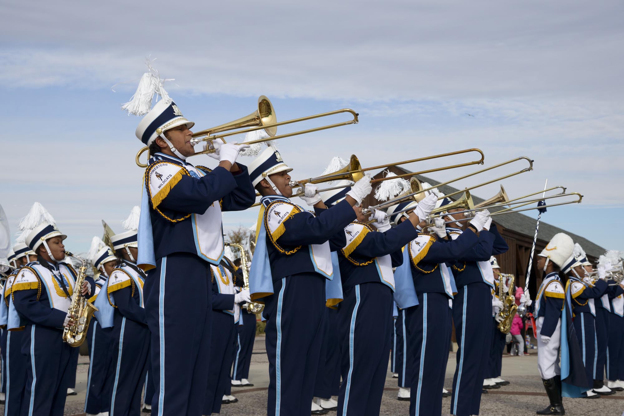 Image of the Wildcats marching band playing the trombone 
