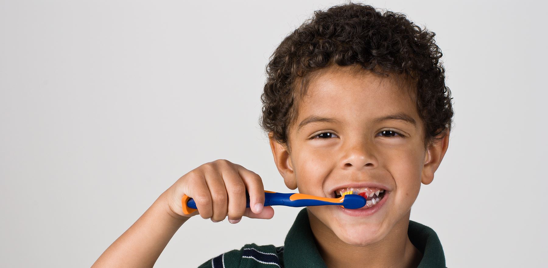 Child Brushing His Teeth