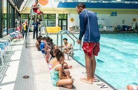 Kids at swim class with instructor