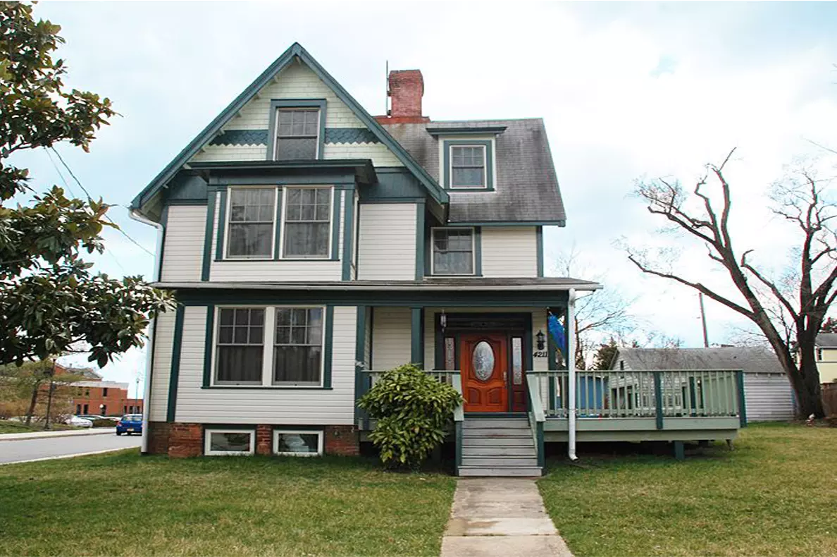 Nicely maintained established house and clean yard, gingerbread trim and well-kept