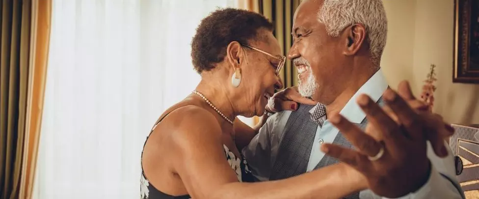 photo of older couple dancing